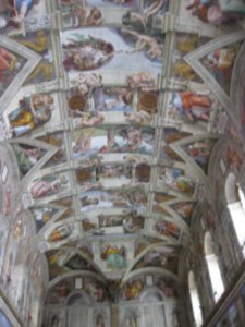 An out of focus photo of the Sistine Chapel roof