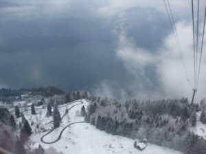 A rare glimpse through the cloudline to the Lake below