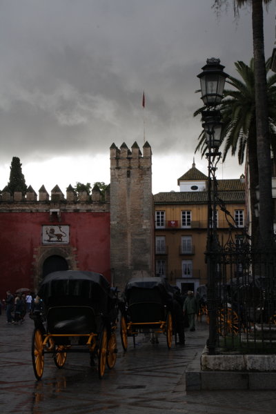 Horse drawn carriages outside the Alcazar