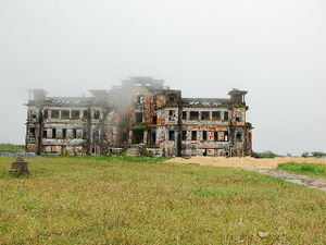 Abandoned hotel wreathed in fog