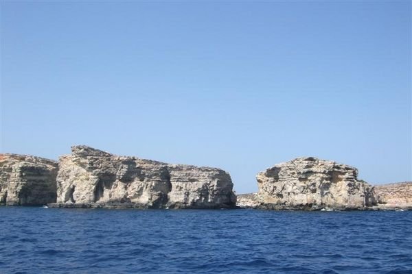 approaching caves of comino