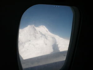 Flying next to the snow capped peaks!