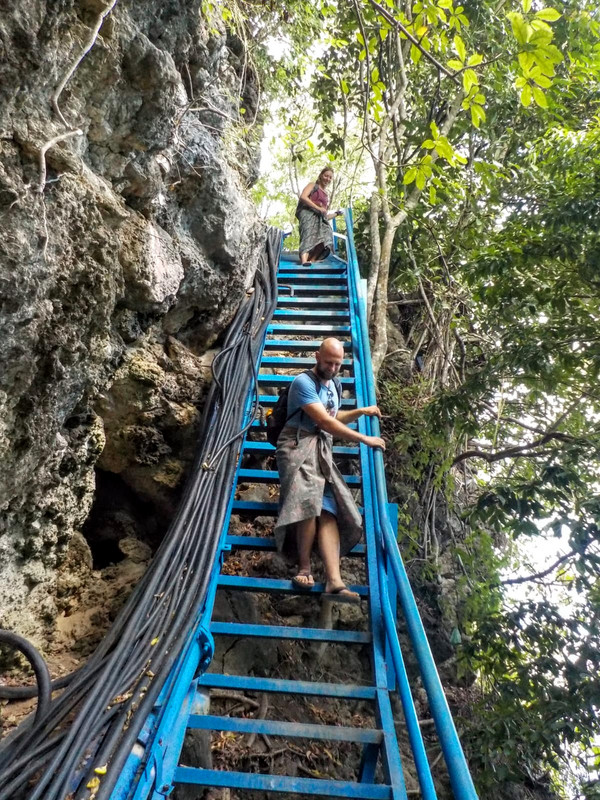 Steep steps to Peguyangan waterfall