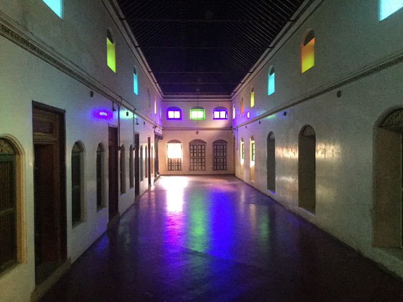 Dining hall lit by Venetian glass