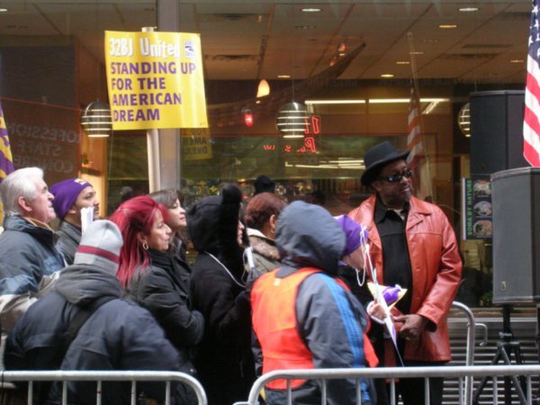 Protest about halving of cleaners wages, off Wall Street