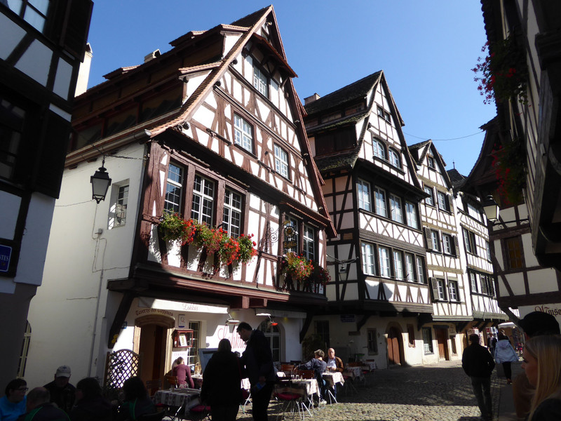 It feature overhanging timber framed houses