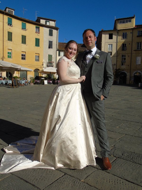 Wesley and Kara, an English couple, enjoying their wedding day in the Piazza