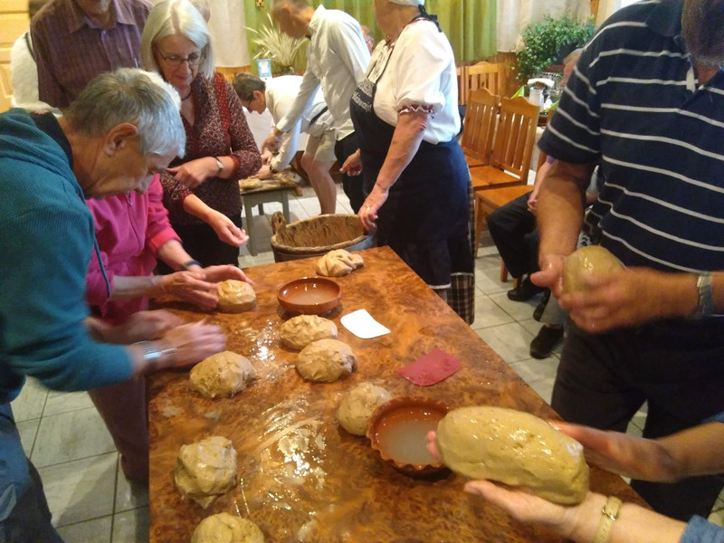 Having a go at bread making in the museum