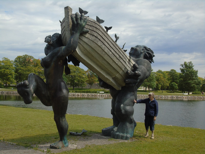 Saaremaa’s legendary gigantic hero, Suur Toll and his wife Piret carrying a boat laden with fish