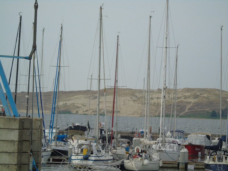 The port of Nida is backed by some of the sand dunes which run down the spit