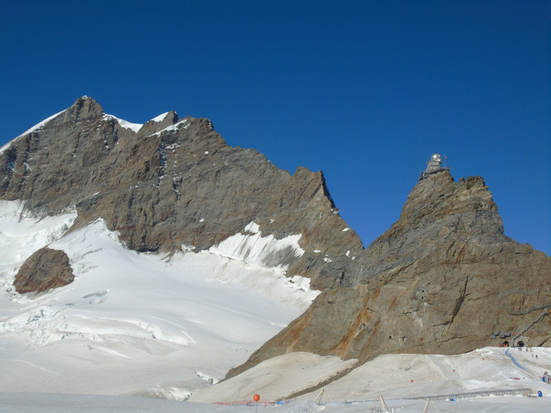 The Sphinx on top of its rock pillar with the Mönch in the background