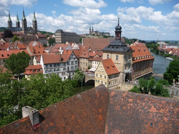 An outstanding view of the town from the tower of a large riverside house. The old town hall is in the foreground, the Dom top left and a former Benedictine Monastery, Michaelsberg top right.