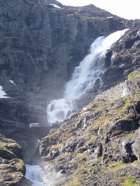A campervan crossing Stigfossen falls