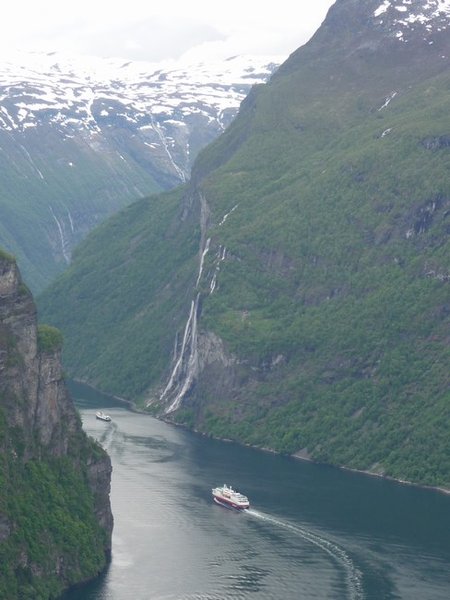 First view of Geirangerfiord with a Hurtigruten boat