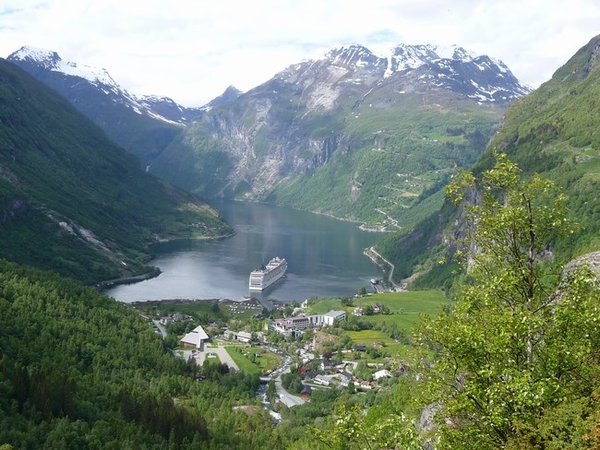 The view from the other direction. We were amazed that such a large ship could get so close to the edge of the fiord. The Geiranger hairpins are on the right