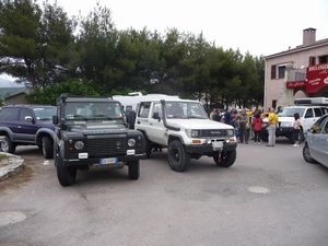 We stopped at a boulangerie which was crowded with a group of Italian 4x4s who were touring Corsica. Most of them wore yellow tee shirts
