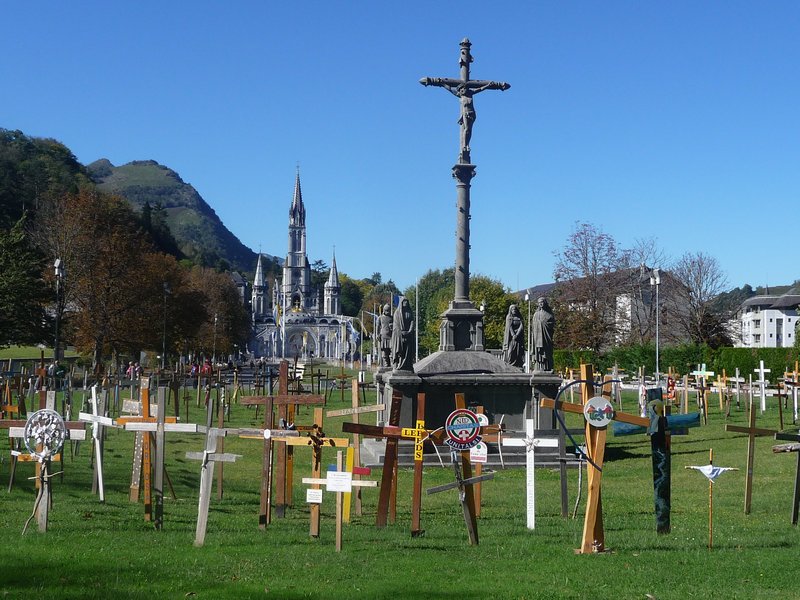A Calvary at the entrance to the complex surrounded by crosses carried there by groups of pilgrims from all over the world