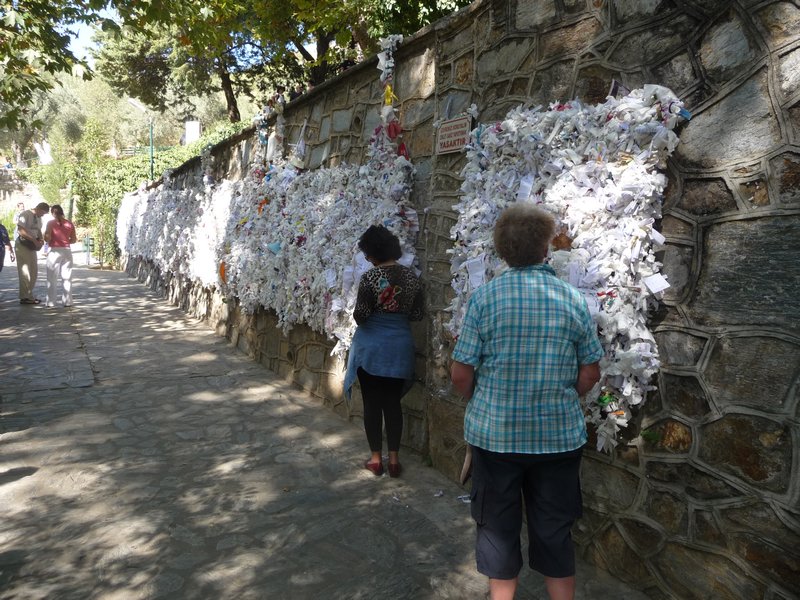 There is a wall near the house where pilgrims can leave their messages
