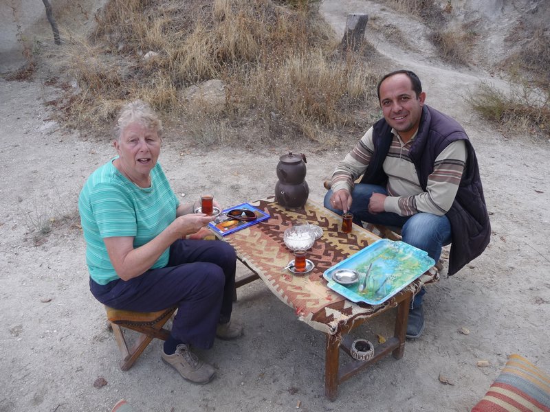 Turkish tea with the church guardian while he tried to sell us a Cappadocian guide