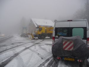 A plough endeavouring to keep the roads clear on the Col