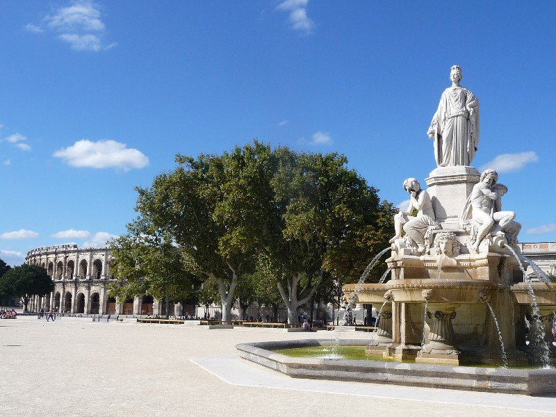 One of the Nimes squares with the arena in the background