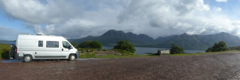 The van admiring the loch and mountain scenery in the morning light