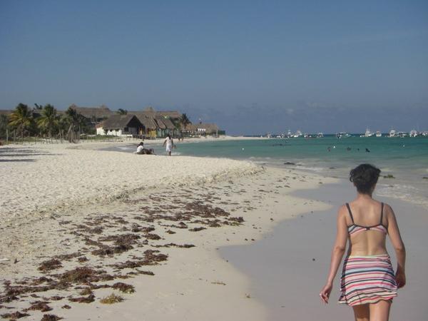 Helen walking along the beach in Playa Del Carmen