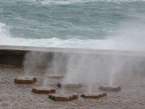 Blowholes which spray up wind and water