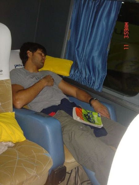 Sanj jet lagged on the semi-cama bus to Iguazu