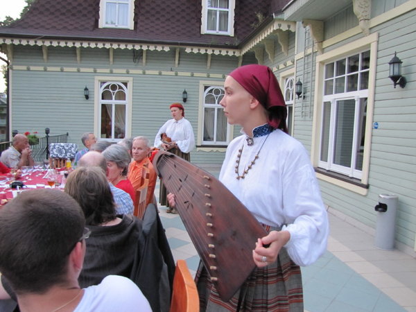 Latvian dinner with a flipper as an instrument