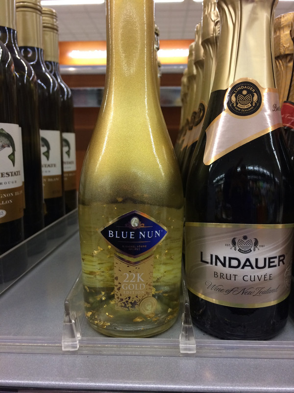 sparkling blue nun wine with 22k gold flakes