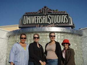 Girls in front of Universal sign