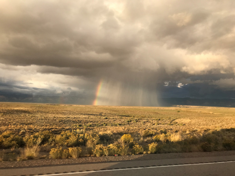 Magnificent rain storm and rainbow on the way to Moab