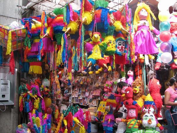 Colourful pinatas stall