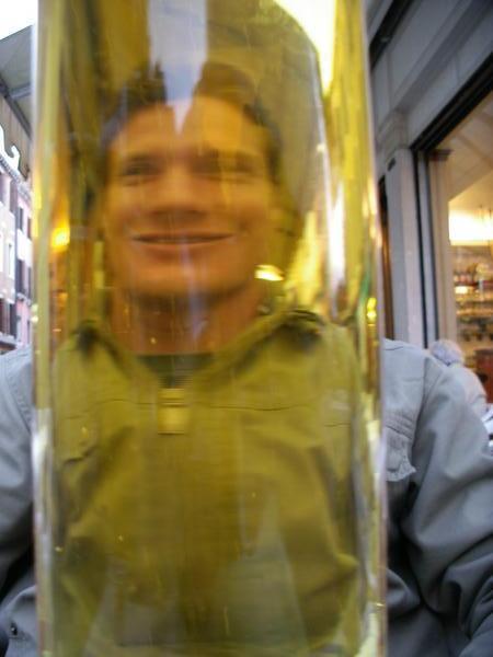 Justin through a beer glass