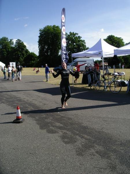 Running to my bike after completing the swim leg