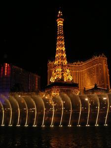 The Bellagio fountains with "Paris" in the background 