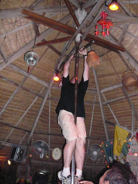 Allan climbing the pole