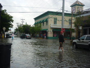Man walking through flood