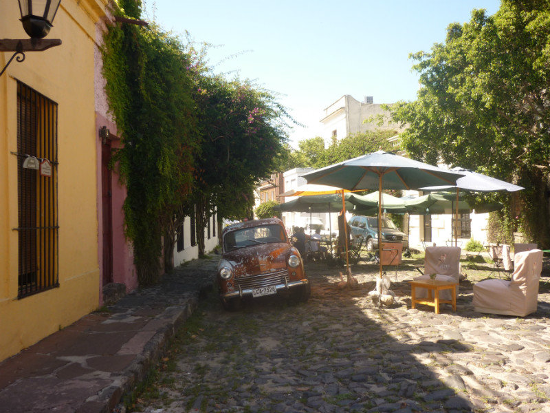 old car, cobblestone streets