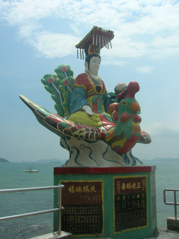 Lady and Chicken Mosiac Statue