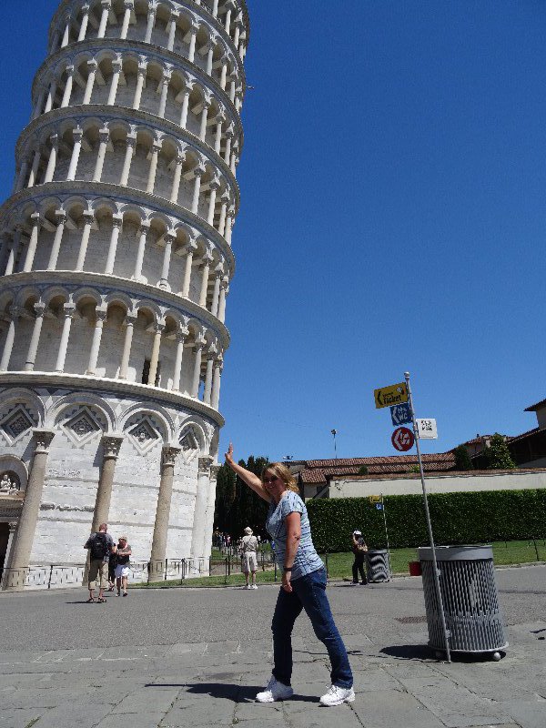 Lisa trying to hold up the tower