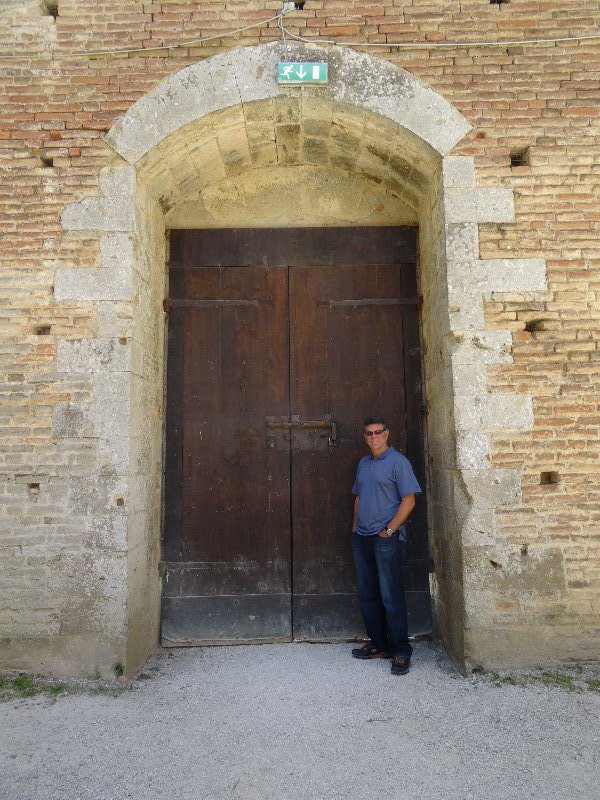 Jim next to a big door at the Abbey