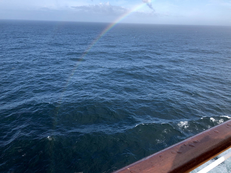 The rainbow continued into the water