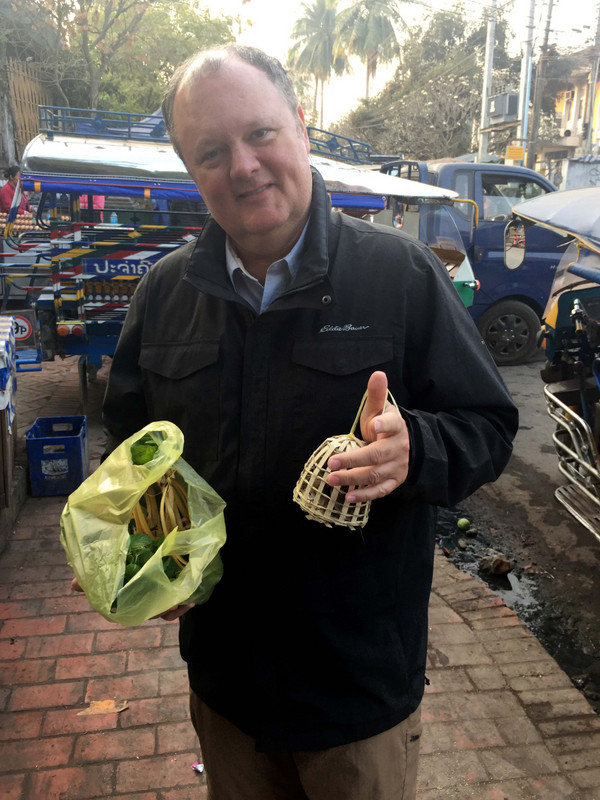 Drury with his mint and birds we purchased at the market