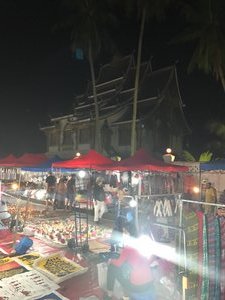 Night market with the temple in the background