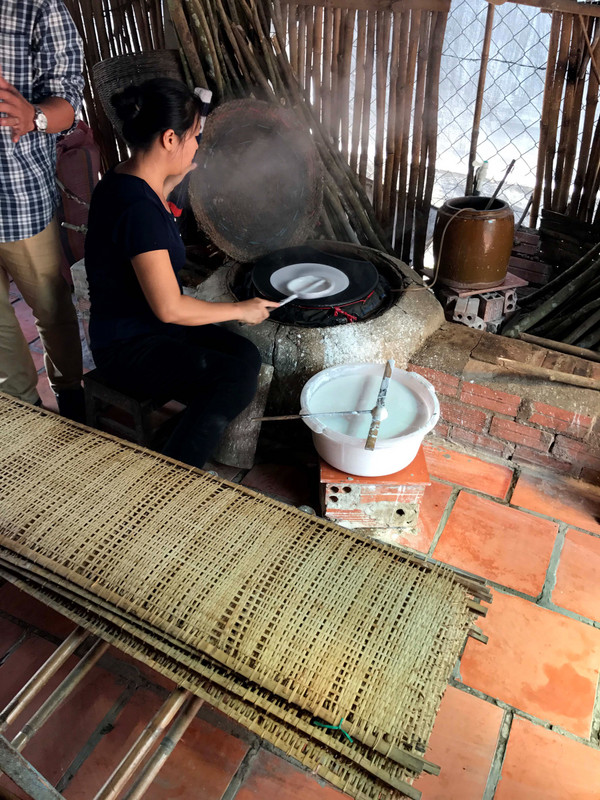 Woman making rice paper