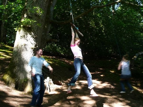 Playing with the swings in the forest