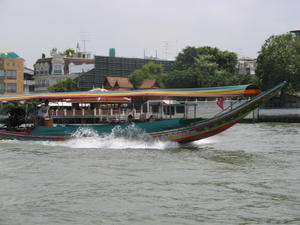 Longtail boat touring the khlongs (Canals)