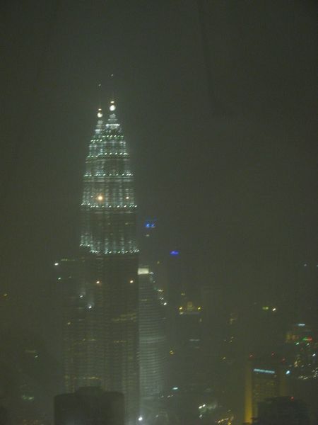 The cloud clears around the Petronas towers